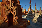 Inle Lake Myanmar. Indein, on the summit of a hill the  Shwe Inn Thein Paya a cluster of hundreds of ancient stupas. Many of them are ruined and overgrown with bushes. 